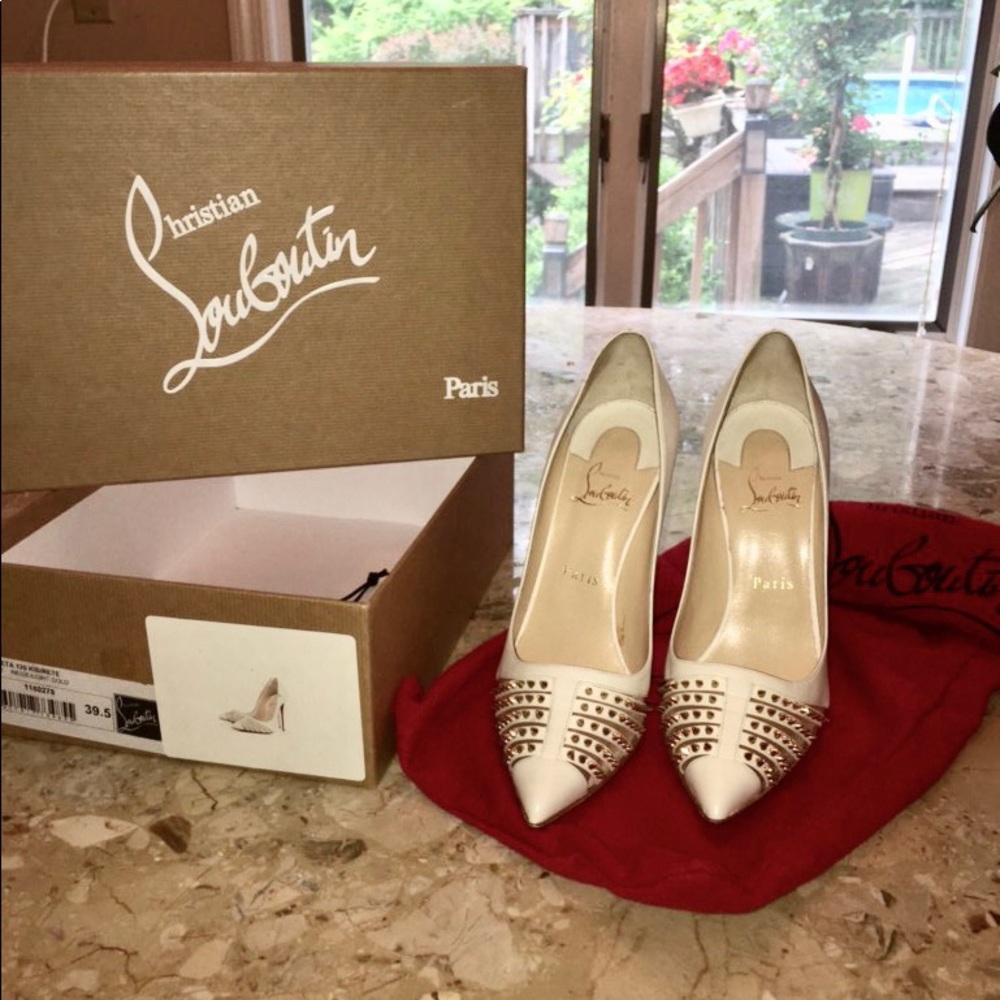 Never Worn White Louboutin heels